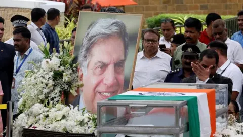 Reuters People pay their respects to former Tata Group chairman Ratan Tata, in Mumbai, India, October 10, 2024. 