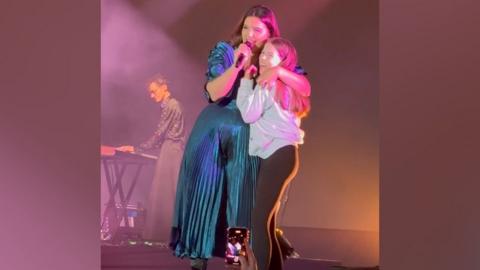 Isabella and Jessie Ware on stage at the Cambridge Club Festival