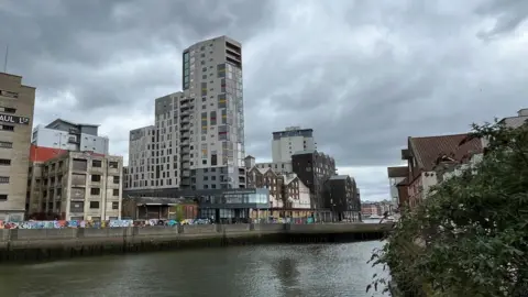 Richard Daniel/BBC The development by the river.