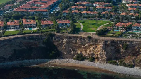 Getty Images Homes on a cliff