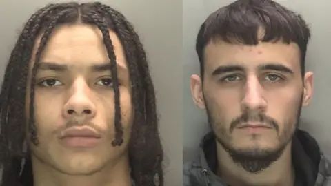 Tobias Williams with shoulder length brown braids, he has a neutral expression on his face and is against a grey background. David Shaikh has short straight dark brown hair, dark moustache and goatee beard. He is wearing a black and grey waterproof jacket and is against a grey background.

 