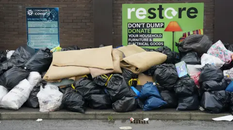 PA Media Rubbish on street 