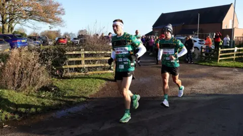 Kevin Sinfield, leaves Naseby village hall as he takes part in day six, of 'Running Home For Christmas' 7 In 7 In 7 Marathon Challenge from Northampton to Leicester