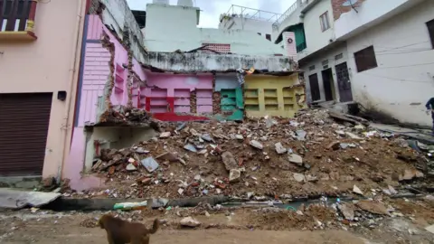 The razed site where Heena's house stood