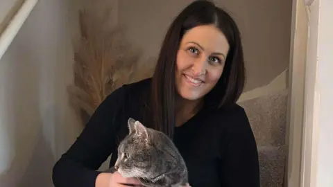 Danielle with a cat called Bodhi