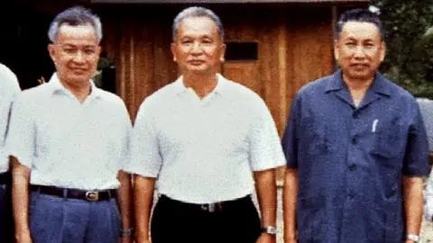 Reuters Nuon Chea, centre, alongside Pol Pot, right, and Khieu Samphan in 1986