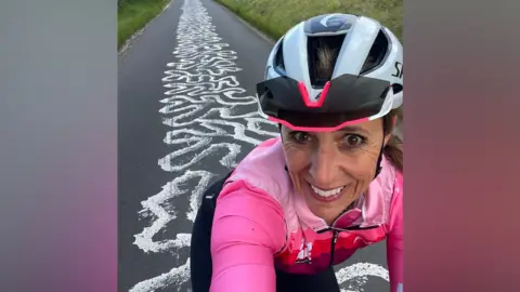Michelle Sharland Michelle Sharland selfie on her bike