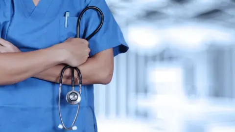 Pablo_K/Getty doctor with stethoscope