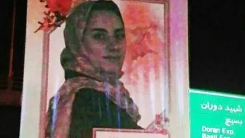 @saeidiftm Prize-winning mathematician Maryam Mirzakhani appearing on a billboard in Tehran