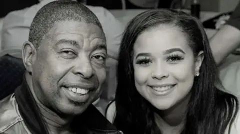 Handout Everton Smith with his daughter Eve