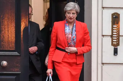 BEN STANSALL/AFP British Prime Minister Theresa May leaves the Conservative Party HQ in central London, on June 9, 2017, hours after the polls closed in the British general election