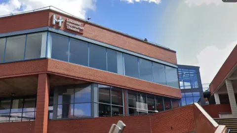 The exterior of the brick-built and glass-fronted Haymarket theatre 