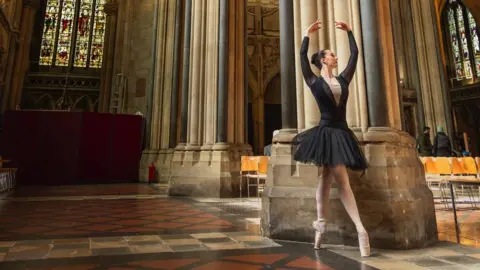 Paul Hassell Image of Ava May Llewellyn dancing in Bristol Cathedral