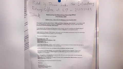 Oxford Union A white piece of paper on which the Oxford Union shared the outcome of the no-confidence vote on Tuesday morning.