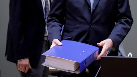 Reuters EU chief negotiator Michel Barnier seen on Christmas Day with the full post-Brexit text