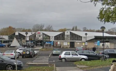 Google Northampton railway station as it was in 1982 with three long sheds