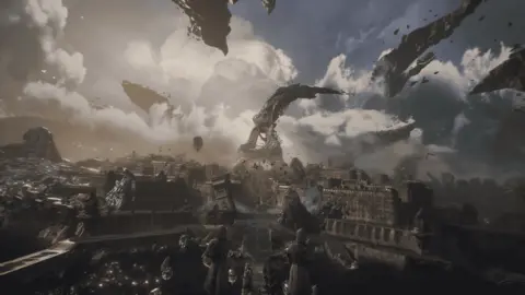 Sandfall Interactive A view of a post-apocalyptic version of Paris with an Eiffel Tower-style structure bent almost 90 degrees sideways at its centre. Other battered landmarks such as the Arc du Triomphe are also visible.