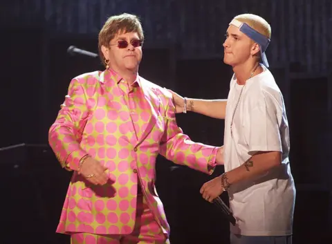 Getty Images Eminem responded by performing Stan at the ceremony with the openly gay Sir Elton John, who would later help the rapper with his addiction struggles