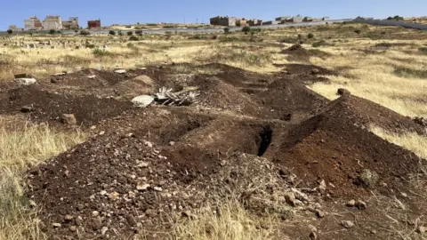 EPA A cemetery prepared for burying the bodies of deceased migrants in Nador, Morocco