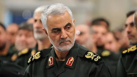 A file photo from 2016 showing the late Iranian Quds Force commander Qasem Soleimani wearing military attire.
