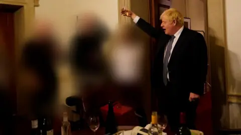 Sue Gray Report/Cabinet Office Boris Johnson pictured at a lockdown event