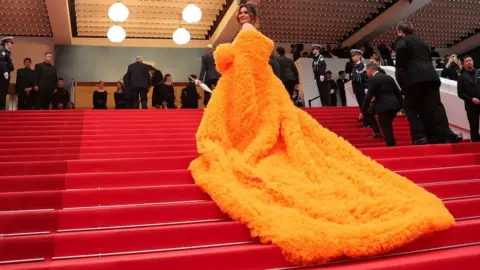 Reuters Deepti Sadhwani poses on the red carpet during arrivals for the opening ceremony and the screening the film "Le deuxieme acte" (The Second Act) Out of competition at the 77th Cannes Film Festival in Cannes, France, May 14, 2024