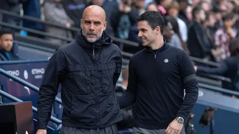 Pep Guardiola and Mikel Arteta