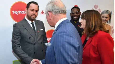 PA Danny Dyer shakes hands with Prince Charles at the Prince's Trust Awards