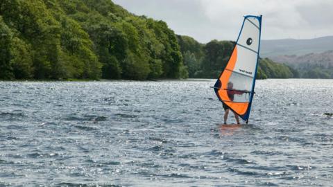 A windsurfer on Coniston Water