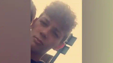 Supplied Cameron Gosling is a 14 year old boy who has curly brown hair and is looking at the camera.