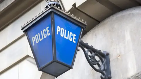 Getty Images Police station sign