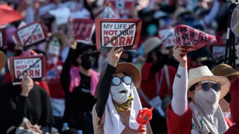 Getty Images South Korean women hold up signs saying My Life Is Not Your Porn at a protest in Seoul