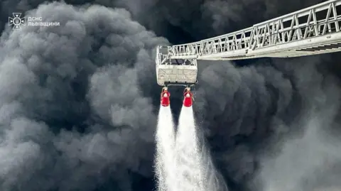 Ukraine emergency services DSNS published photos of smoke from the Brody oil hub following a Russian bombardment