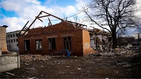 Ukrainian National Police Destroyed houses in a border village in Ukraine