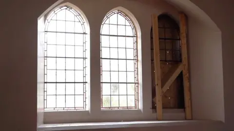 Oli Constable/BBC A damaged window