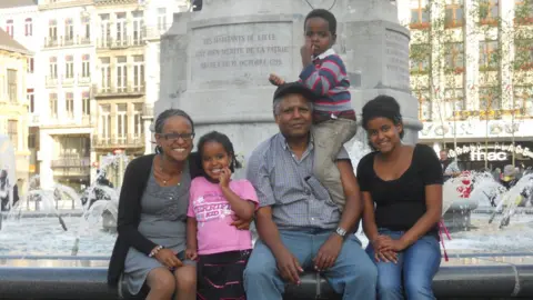 Yemi Hailemariam Yemi Hailemariam (far left), Andy Tsege (centre right) and their children