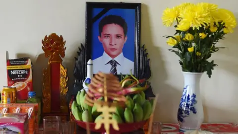 Nhac Nguyen/AFP/Getty Images A portrait of Le Van Ha on a prayer altar at his house in Vietnam's Nghe An province