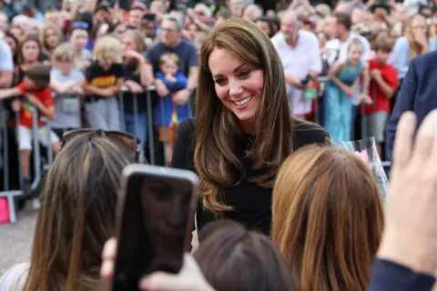 Paul Childs / Reuters Britain's Catherine, Princess of Wales, greets people outside Windsor Castle