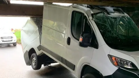 Cambs Police Van under bridge