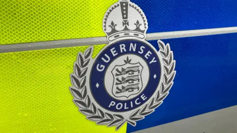 BBC Logo of Guernsey Police on police car