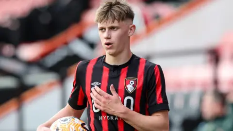 Charlie Osborne pictured in a Bournemouth shirt
