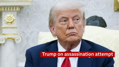 Donald Trump sitting on a yellow chair in the oval office with a graphic on screen that reads 'Trump on assassination attempt'.