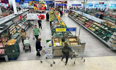 Getty Images View of Tesco supermarket aisles
