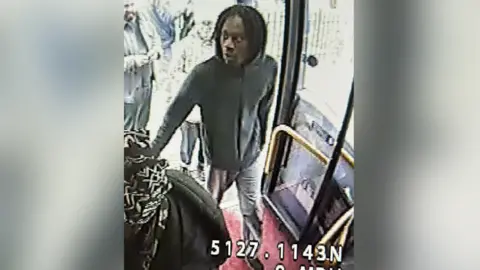 Boakye boarding a bus, captured on CCTV 