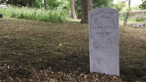 North Shields Heritology Project A white marble gravestone in Preston Cemetery with the inscription Robert Renoldson in an engraved shield.