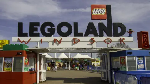 Wirestock/Getty Images The entrance to Legoland in Windsor on a sunny but cloudy day