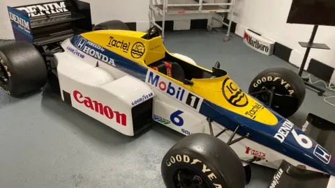 A side view of the Formula 1 car
