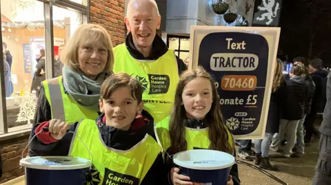 Louise Parry/BBC Hugo and Lucy fundraising with grandparents Jean and Ian