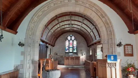 Linton Kirk Heritage Appeal A picture of the sandstone arched chancel around the alter in Linton Kirk.