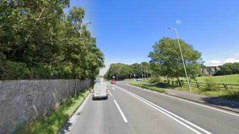 The A487 at the junction of A487 Faenol Hill, in Bangor, Gwynedd